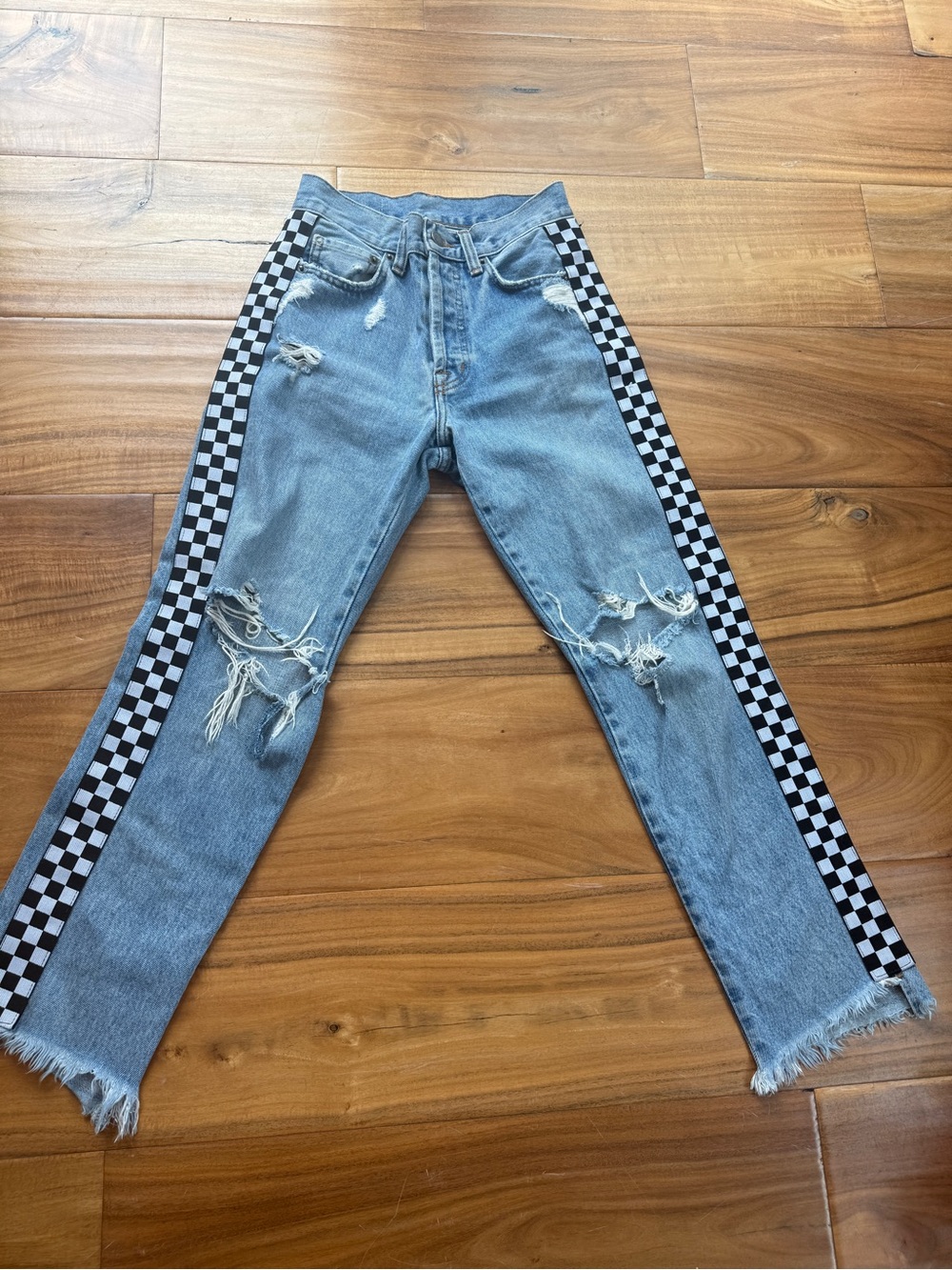 Light blue CARMAR ripped jeans with BOLD black and white checkered sides